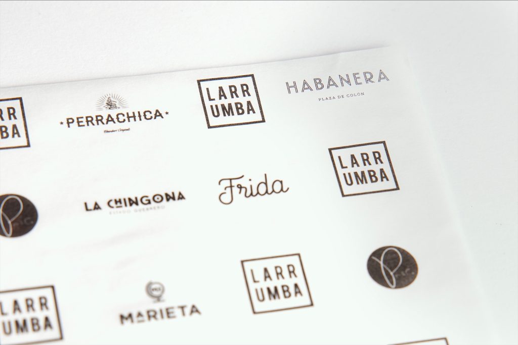 Greaseproof paper printed with restaurant logos