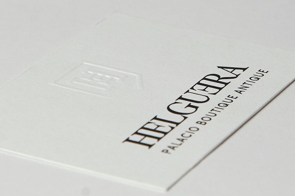 Card with blind-embossed logo